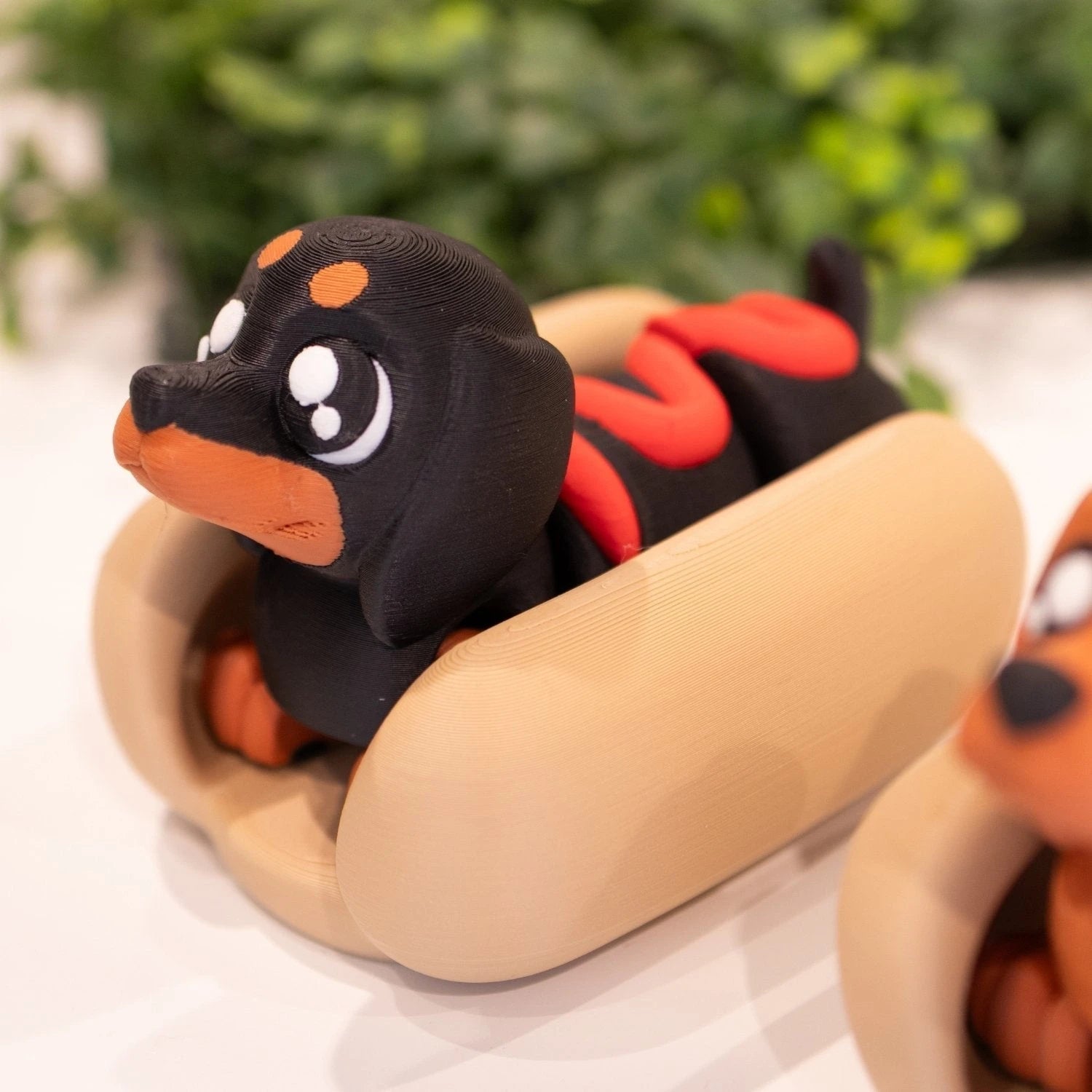 Figurine 3D chien hot-dog ketchup