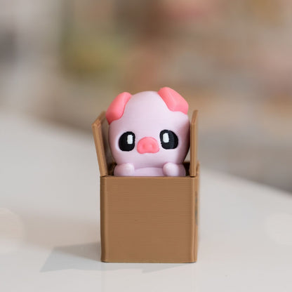 Clicker fidget TDAH cochon dans carton kawaii imprimée en 3D à Cognac