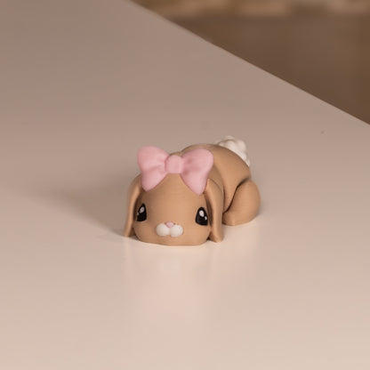Figurine articulée lapin beige kawaii. Modèle imprimé en 3D à Cognac. 
