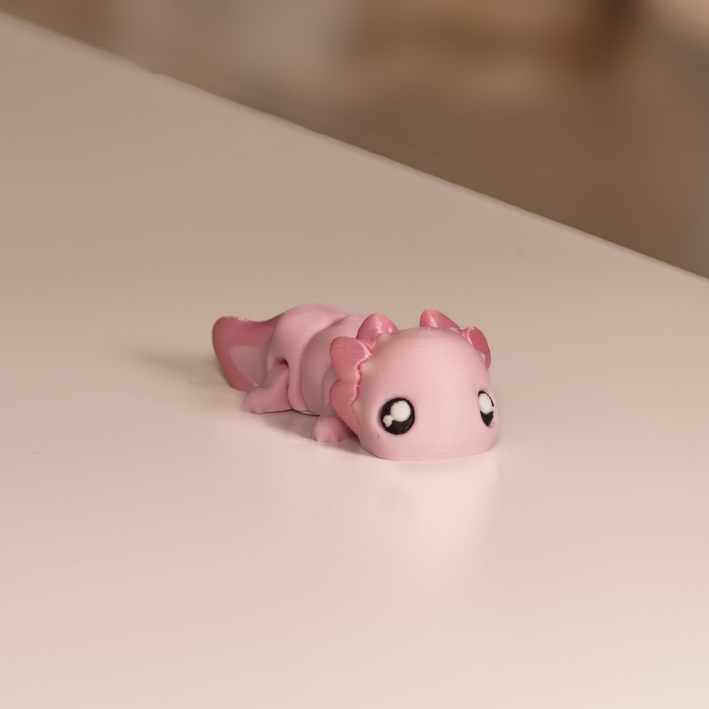Figurine axolotl kawaii rose. Modèle articulée imprimé en 3D. 
