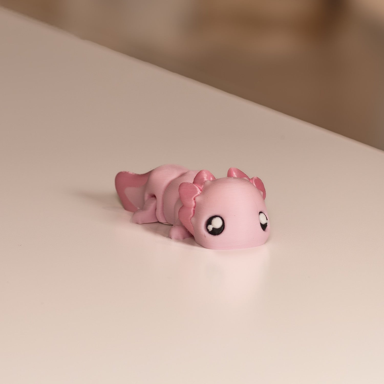 Figurine axolotl kawaii rose. Modèle articulée imprimé en 3D. 