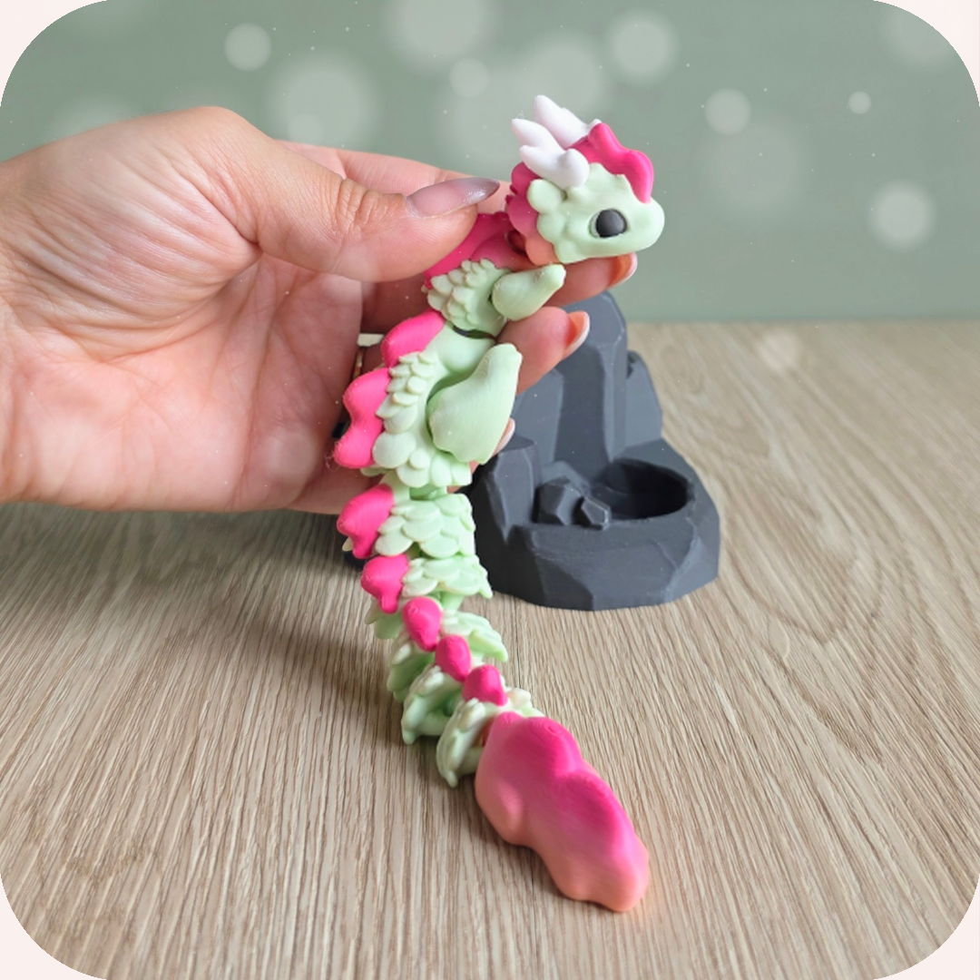 Figurine bébé dragon vert et rose