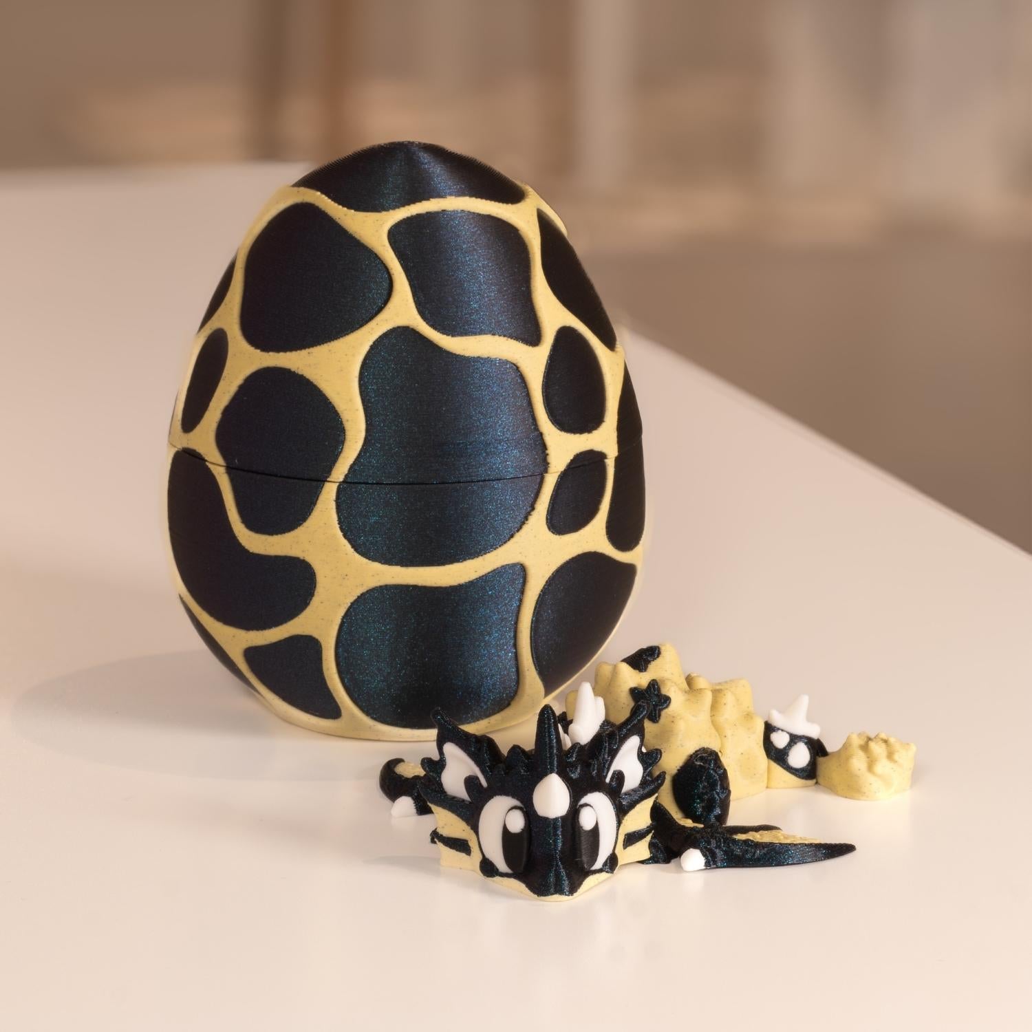 Dragon figurine 3D, dragon marin kawaii, figurine articulée et son oeuf imprimés en 3D à Cognac. 