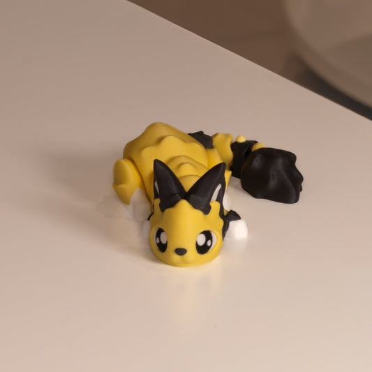 Dragon figurine 3D, dragon jaune kawaii, figurine articulée imprimée en 3D à Cognac. 