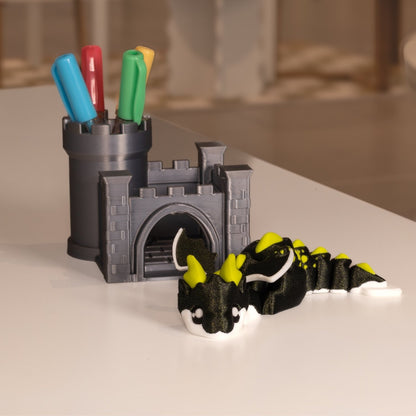 Dragons figurines kawaii, Cosmos noir et jaune et son château pot à crayon. Modèle articulé imprimé en 3D à Cognac. 