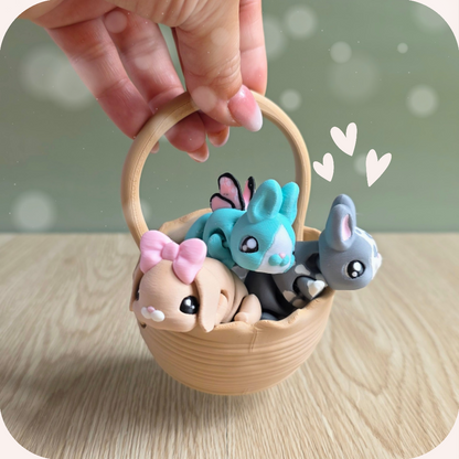 Panier avec ces trois figurines lapins kawaii imprimés en 3D