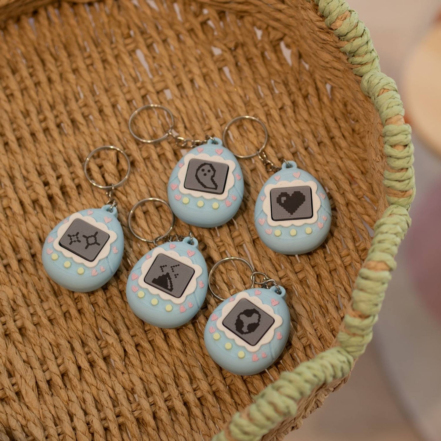 Porte-clé tamagochi bleu