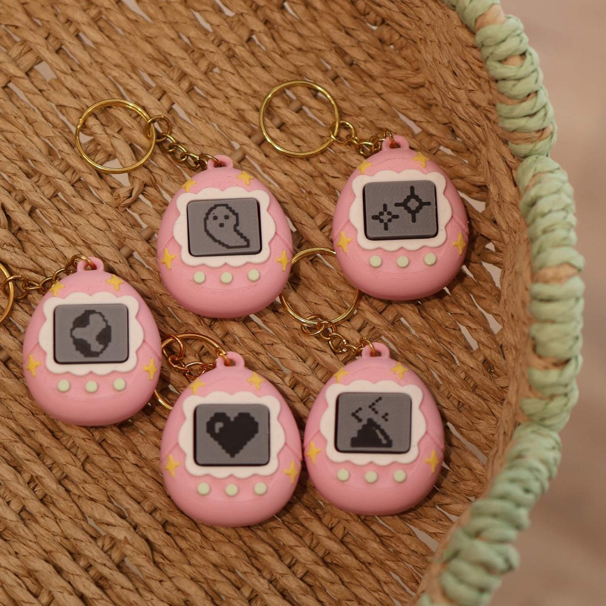 Porte-clé tamagochi roses