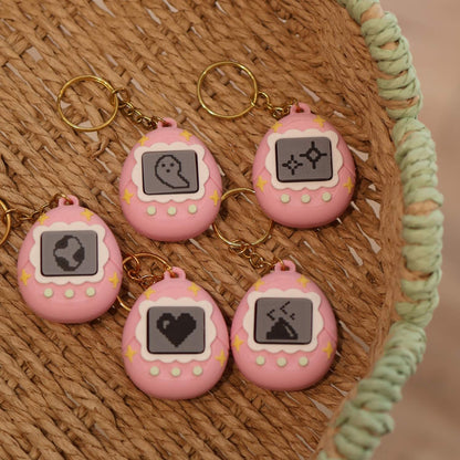 Porte-clé tamagochi roses