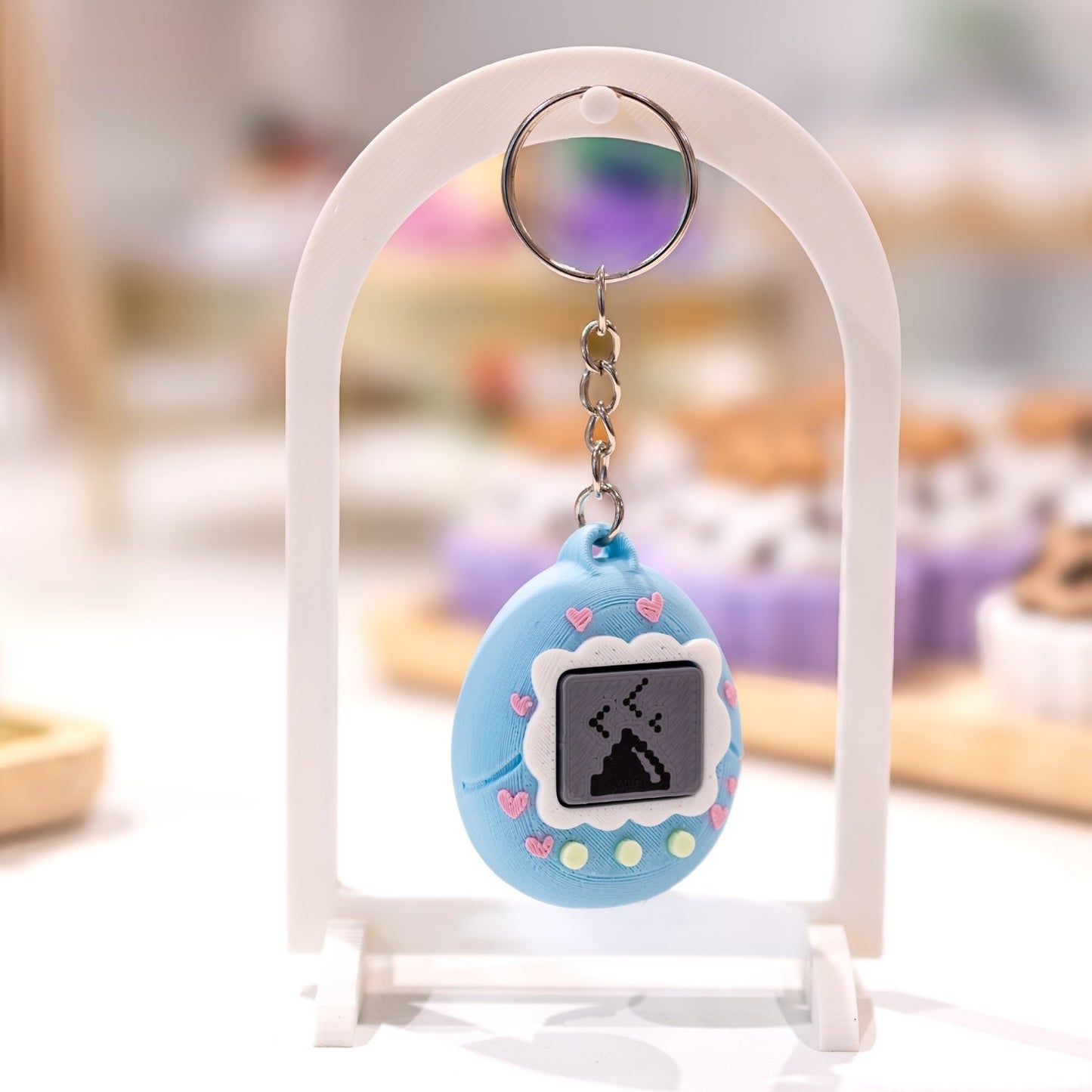 Porte-clé clicker tamagotchi kawaii caca clicker fidget anti-stress