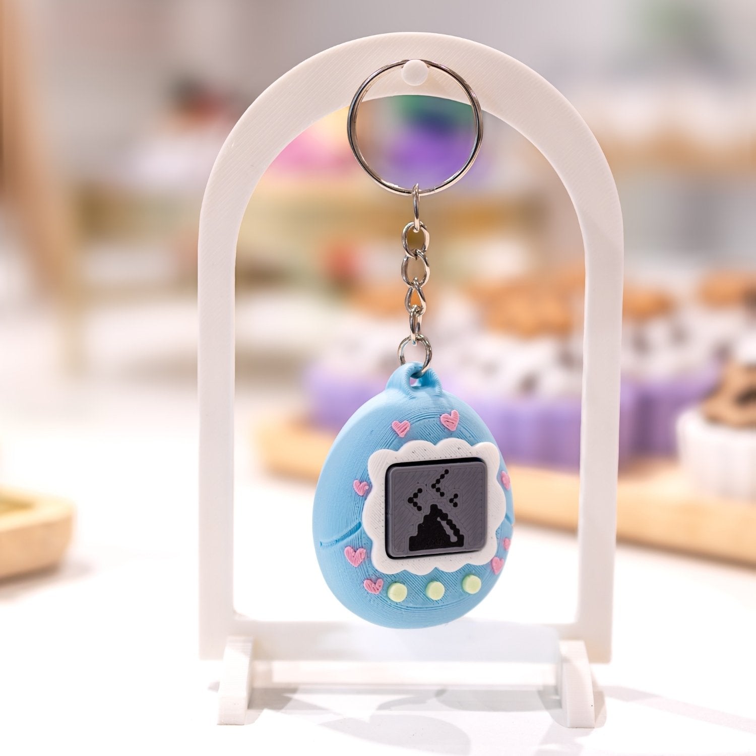 Porte-clé clicker tamagotchi kawaii caca clicker fidget anti-stress